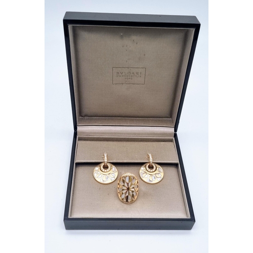 388 - A Bulgari 18k Yellow Gold, Diamond and Mother of Pearl Jewellery Set. Ring - size M. 38.2g total wei... 