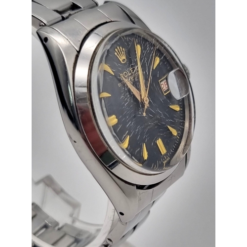 794 - A Vintage Rolex Oyster Perpetual Date Gents Watch. Stainless steel strap and case - 34mm. Black dial... 