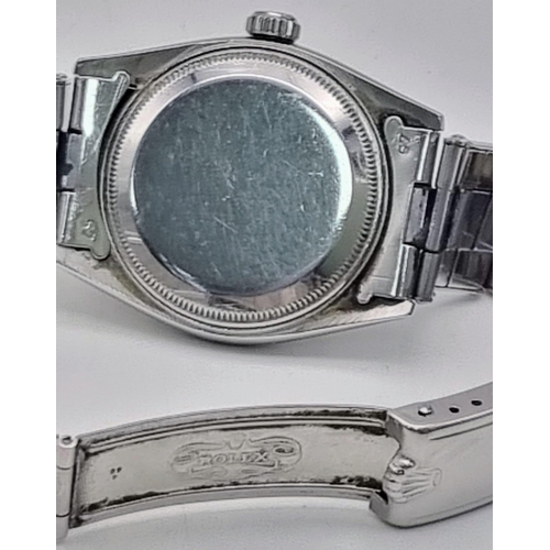 794 - A Vintage Rolex Oyster Perpetual Date Gents Watch. Stainless steel strap and case - 34mm. Black dial... 