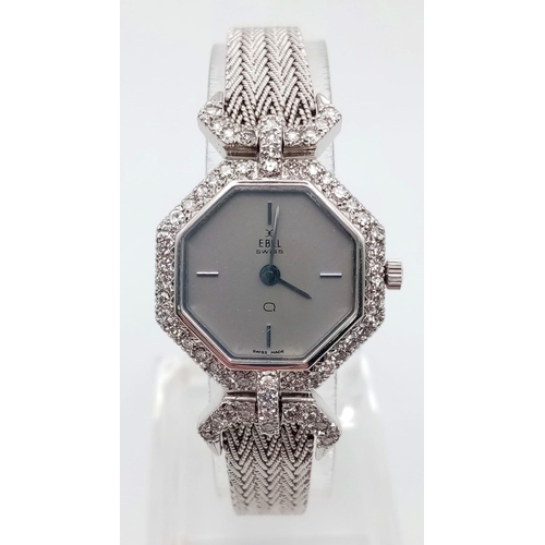 1310 - An Ebel 18k White Gold and Diamond Ladies Watch. Gold strap and hexagonal case - 22mm. Grey dial. Di... 