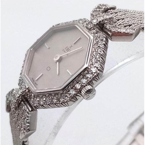 1310 - An Ebel 18k White Gold and Diamond Ladies Watch. Gold strap and hexagonal case - 22mm. Grey dial. Di... 