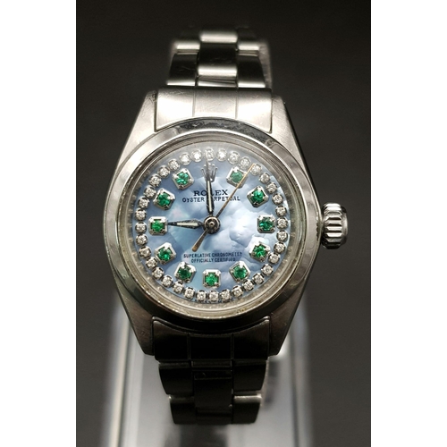 226 - A Rolex Ice-Blue Dial Oyster Perpetual Ladies Watch. Stainless steel strap and case - 25mm. Ice-blue... 