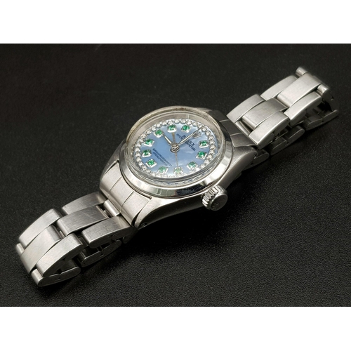 226 - A Rolex Ice-Blue Dial Oyster Perpetual Ladies Watch. Stainless steel strap and case - 25mm. Ice-blue... 