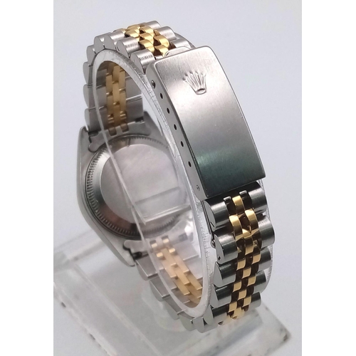 239 - A Rolex Oyster Perpetual Datejust Ladies Watch. Bi-metal jubilee strap and case - 26mm. Gold tone di... 