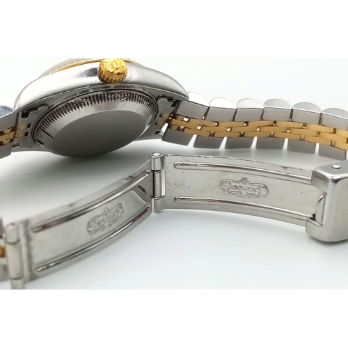 239 - A Rolex Oyster Perpetual Datejust Ladies Watch. Bi-metal jubilee strap and case - 26mm. Gold tone di... 