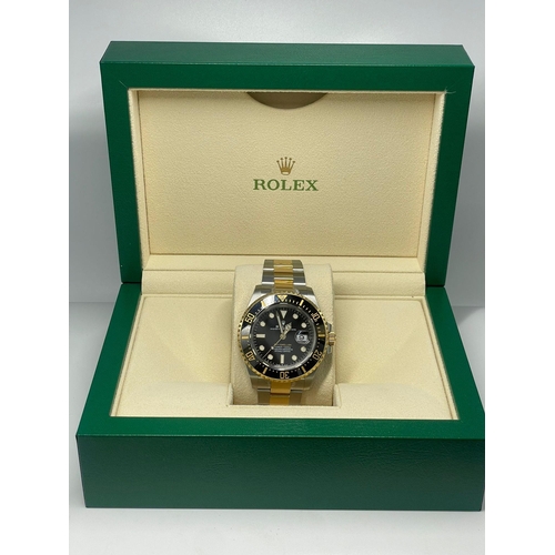 A ROLEX SEA DWELLER BI-METAL WITH BOX AND PAPERS IN VERY GOOD CONDITION ...