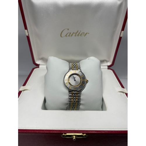 368 - A LADIES CARTIER BI-METAL ELEGANT DESIGN WRISTWATCH WITH BOX AND PAPERS.