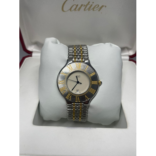 641 - A GENTS CARTIER BI-METAL WATCH WITH BOX AND PAPERS  1994 MODEL IN GOOD CONDITION.