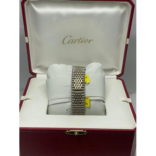 641 - A GENTS CARTIER BI-METAL WATCH WITH BOX AND PAPERS  1994 MODEL IN GOOD CONDITION.