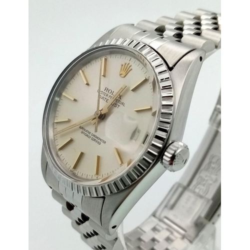 808 - A Rolex Oyster Perpetual Datejust Gents Watch. Stainless steel strap and case - 36mm. Cream dial. Au... 