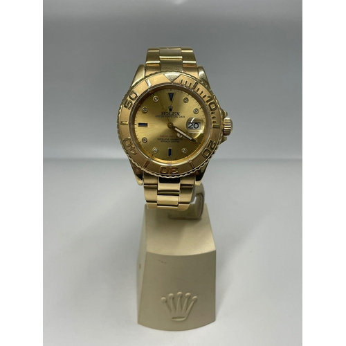 9 - ROLEX YACHTMASTER IN 18K GOLD WITH BOX AND PAPERS, SOLID GOLD STRAP, VERY GOOD CONDITION  40mm