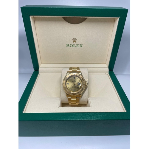 9 - ROLEX YACHTMASTER IN 18K GOLD WITH BOX AND PAPERS, SOLID GOLD STRAP, VERY GOOD CONDITION  40mm