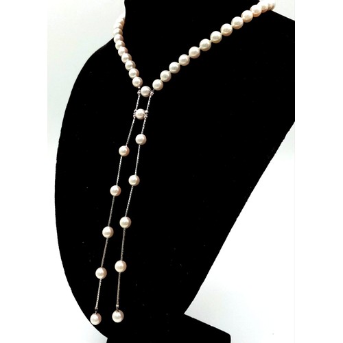 310 - A Victorian-Style Pearl Necklace with Pearl Drops. 35g. 36cm and two 16cm drops. Comes in a presenta... 