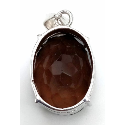 1179 - An Oval Smoky Quartz 925 Sterling Silver Pendant. 35mm.