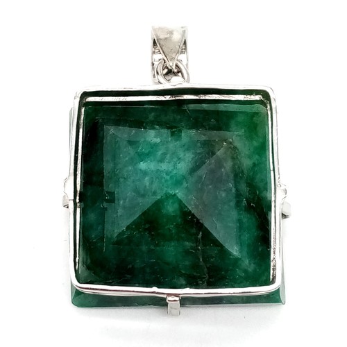 782 - An Antique-Style Large Emerald Pendant. Rectangular step cut. 925 Sterling silver. Approx 100ct. 64.... 