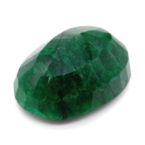 452 - A 236ct Faceted Oval Shape Emerald. Comes with a GLI Certificate. Colour enhanced.