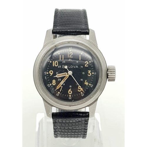 274 - A WWII BULOVA MILITARY 1940'S MANUAL WRIST WATCH WITH BLACK LEATHER STRAP.   31mm