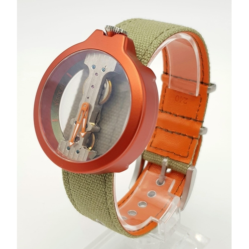 281 - A VERTICALE DOUBLE SKELETON DESIGNER WRIST WATCH ON A CANVAS STRAP.