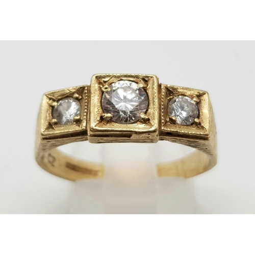 341 - A classic 3 stone ring set in 9k yellow gold, Ring size R1/2, total weight 3.8 grams