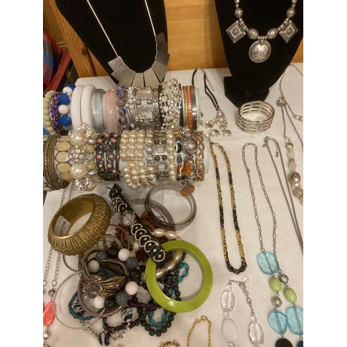 463 - A tabletop of better quality costume jewellery to include M & S,Next etc. Several statement pieces i... 