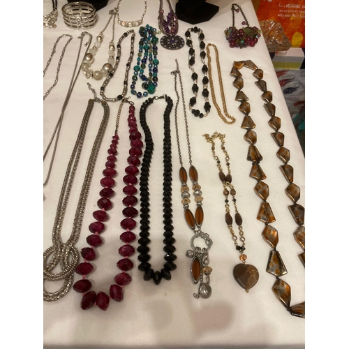 463 - A tabletop of better quality costume jewellery to include M & S,Next etc. Several statement pieces i... 