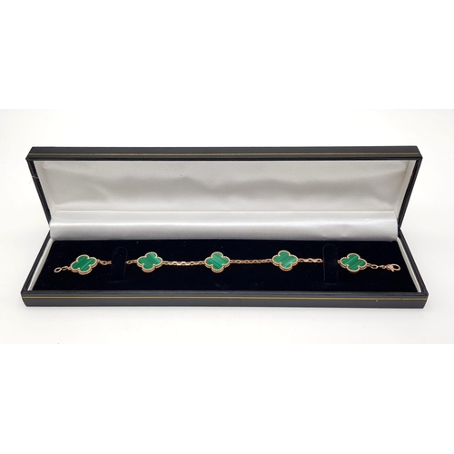 776 - A Van Cleef and Arpels Alhambra bracelet with 5 motifs - 18ct rose gold with malachite inserts. Leng... 