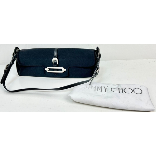 234 - A Jimmy Choo Black Clutch/Small Handbag. Silver tone and white stone hardware. Zipped inner compartm... 