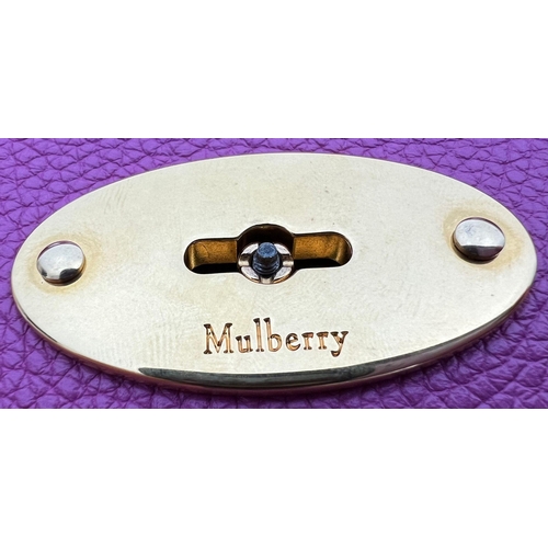 290 - A Mulberry Purple Leather Handbag with Dust Cover. Gilded hardware. Zipped interior compartment. In ... 