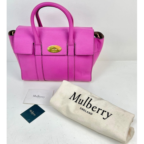 290 - A Mulberry Purple Leather Handbag with Dust Cover. Gilded hardware. Zipped interior compartment. In ... 