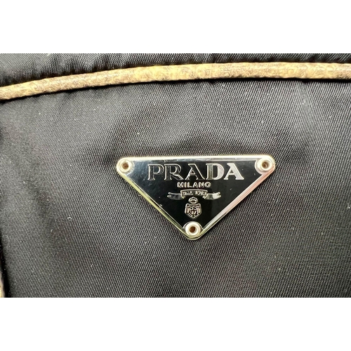 429 - A Prada Nylon and Snake Skin-esque Handbag. Monogram interior with zipped compartment. 34 x 16cm. Re... 