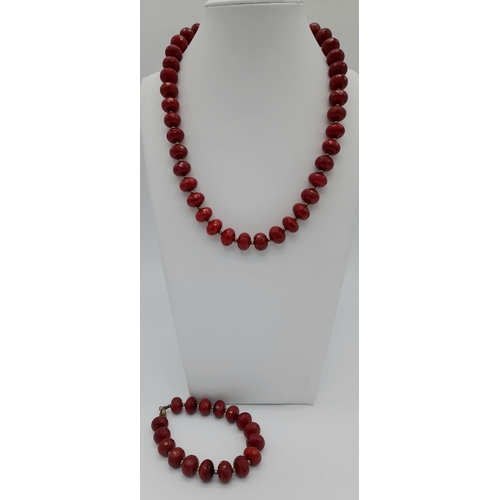 1137 - A BEADED RED FACETED STONE NECKLACE WITH SILVEER CLASP 103.5G