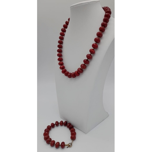 1137 - A BEADED RED FACETED STONE NECKLACE WITH SILVEER CLASP 103.5G