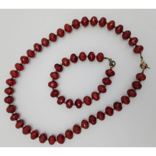 1137 - A BEADED RED FACETED STONE NECKLACE WITH SILVEER CLASP 103.5G