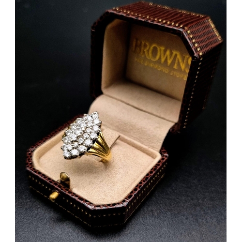 18 - A Browns 18K Yellow and White Gold Diamond Cluster Ring.
Twenty-nine brilliant round cut diamonds. 2... 