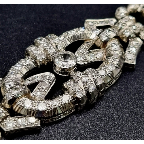 246 - A SPECTACULAR ANTIQUE DIAMOND BRACELET WITH 9ct OF TOP QUALITY DIAMONDS SET IN PLATINUM. 58.8gms