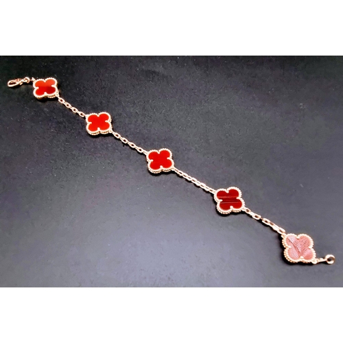 313 - A Van Cleef and Arpels Alhambra bracelet with 5 motifs - 18ct rose gold with cornelian inserts. Leng... 