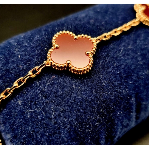 313 - A Van Cleef and Arpels Alhambra bracelet with 5 motifs - 18ct rose gold with cornelian inserts. Leng... 