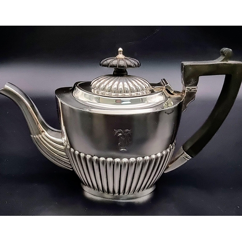 362 - AN ART DECO SOLID SIVER TEA SET HALF FLUTED DESIGN WITH TEA POT, SUGAR BOWL AND CREAMER . HALLMARKED... 