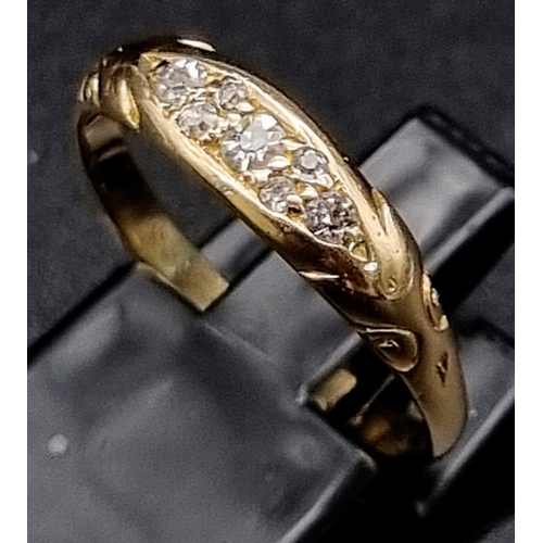 412 - A 18k Yellow Gold 7 Stone Diamond Ring. Size N, Weight 2.4g