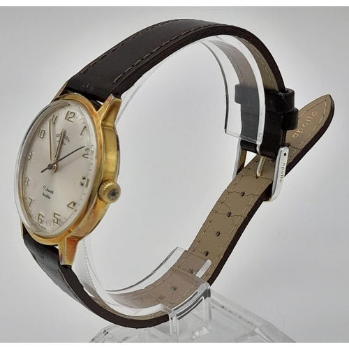 467 - A Vintage Rotary 17 Jewel Incabloc Gents watch. Brown leather strap. Two tone case - 35mm. Silver to... 