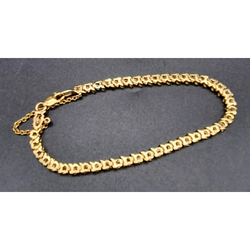 5 - 9K Yellow Gold Diamond set Bracelet. 
1.30ct Diamonds
Weighs 9.1g