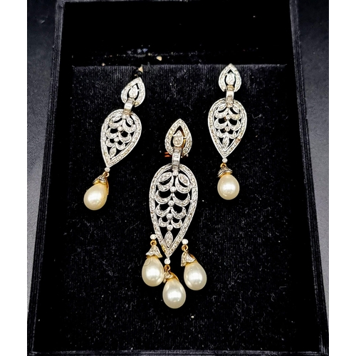 65 - A Middle-Eastern Influenced Diamond Pendant and Drop Earring Set - Decorated with hanging South Sea ... 