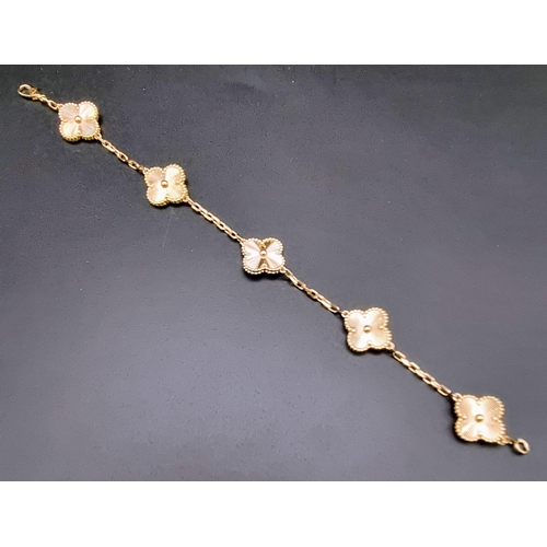 76 - A Van Cleef and Arpels Alhambra bracelet with 5 motifs - 18k yellow gold. Length 19cm. Total weight ... 