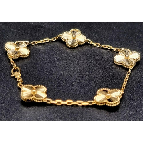 76 - A Van Cleef and Arpels Alhambra bracelet with 5 motifs - 18k yellow gold. Length 19cm. Total weight ... 