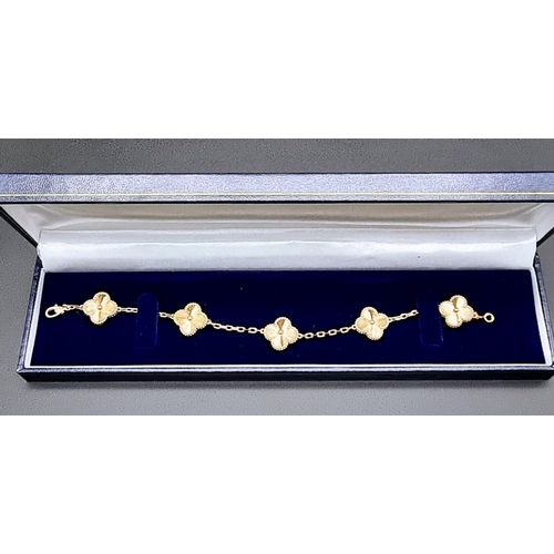 76 - A Van Cleef and Arpels Alhambra bracelet with 5 motifs - 18k yellow gold. Length 19cm. Total weight ... 