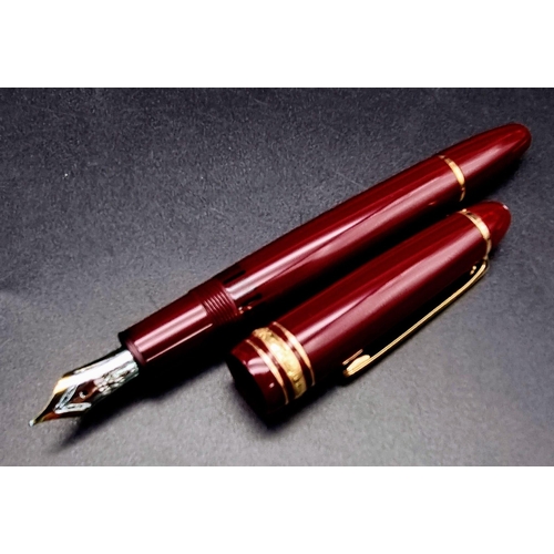 878 - A Mont Blanc 4810 Burgundy Fountain Pen with 14K White Gold Nib.  Comes in a Mont Blanc Box. Ref: 10... 