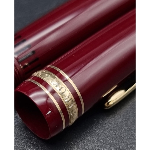 878 - A Mont Blanc 4810 Burgundy Fountain Pen with 14K White Gold Nib.  Comes in a Mont Blanc Box. Ref: 10... 