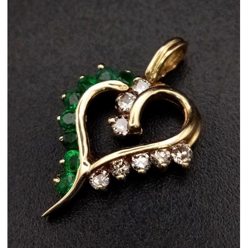 1028 - 14K Yellow Gold Diamond and Emerald Heart Pendant. Weighs 1g