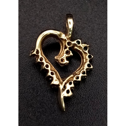 1028 - 14K Yellow Gold Diamond and Emerald Heart Pendant. Weighs 1g