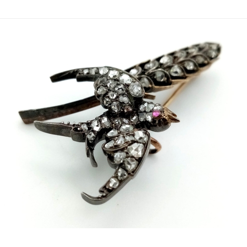 228 - 9K Yellow Gold Swallow Brooch set with old cut Diamonds and a ruby eye.
1.10ct Approx
weighs 5.9g